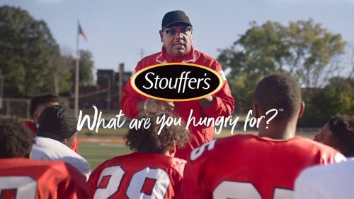 Real-people-Stouffers-Football-team-taking-a-knee