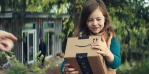 professional-actors-amazon-little-girl-holding-package.